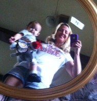 Arya and I show off the variety of mirrors we had for sale.